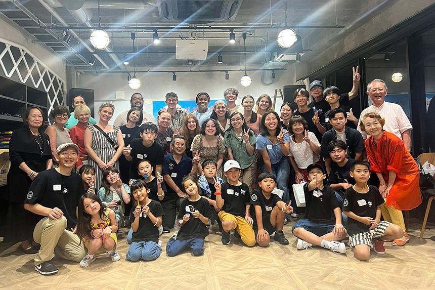 Students pose with elementary school children